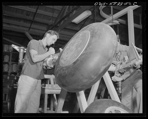Landing gear for a B-25 is checked over prior to delivery to final assembly