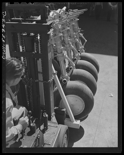 Landing gears completely assembled are delivered to the final assembly floor, where they will be attached to B-25 bombers