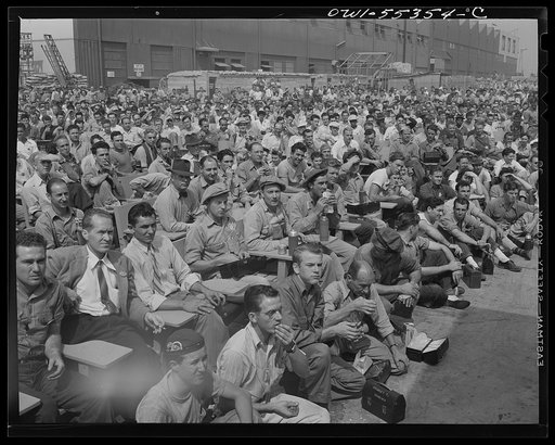 Inglewood, California. Employees enjoying a company program during their lunch hour at North American Aviation, Inc.