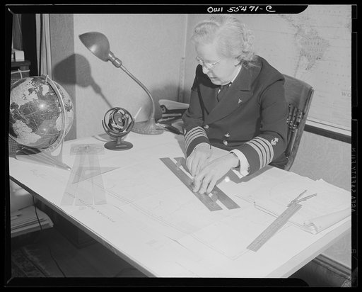 "Captain" Mary Converse, instructing V-7 (candidates for United States Navy ensign commissions) students in use of sextant, compass and gyroscope and in navigation