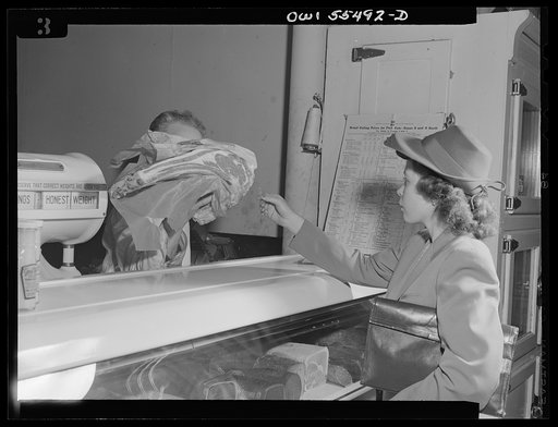 Slaughtering for the "black market" in meat. Shopper accepting a ration point bargain(?) piece of meat