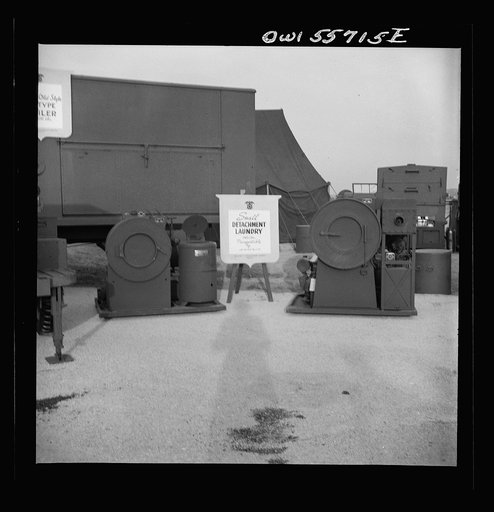 Laundry unit for small detachments. This unit weights 2,465 pounds, will clean and dry 40 pounds of laundry per hour and will serve up to 600 men. Shown with other airborne equipment at demonstration held by United States Army Air Forces