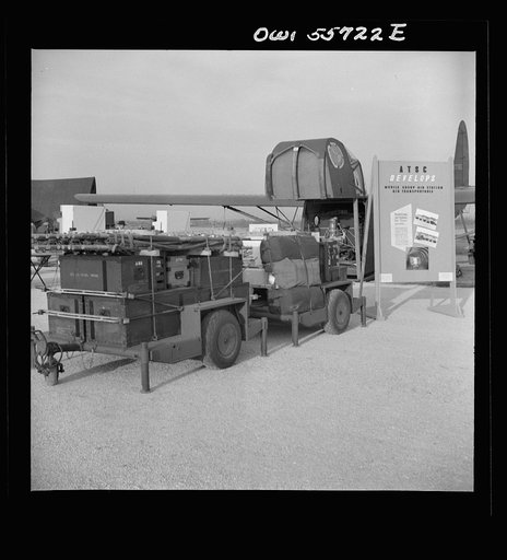 CG-4A glider used to carry utility and service units. It is also a standard troop carrier glider which has been used in every invasion from Sicily through Holland. It carries about 3,700 pounds or 15 fully equipped men. Note efficient assembly of service units in this picture