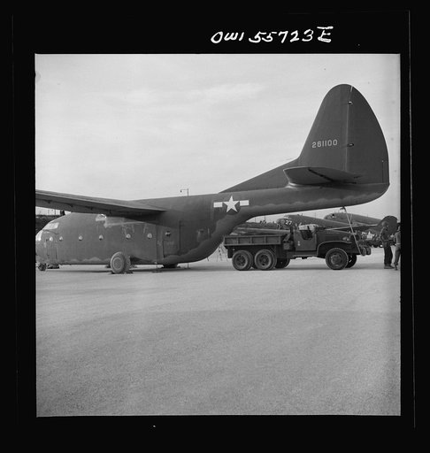 CG-10A. A new design developed to explore the feasibility of carrying very large equiment by glider. This has the largest cargo space of any glider and the largest payload. Note size of truck which has just driven off glider
