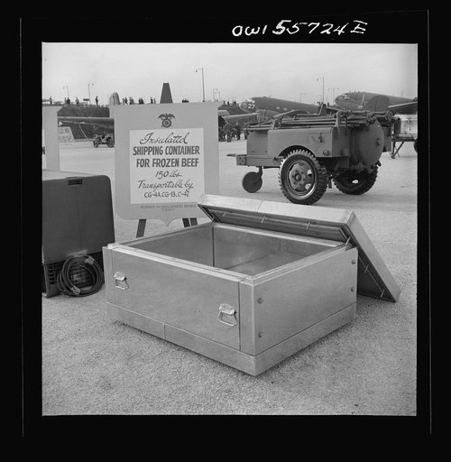 Refrigeration unit. This unit, weighing 1,550 pounds, is gasoline operated, will hold meat rations for 400 men, and is sturdy enough to survive a four or five foot drop. Shown with other airborne equipment at demonstration held by United States Army Air Forces