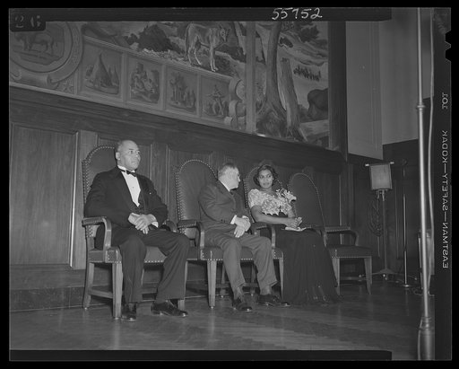 Marian Anderson at the ceremony held in the auditorium of the U.S. Department of the Interior at the dedication of a mural painting commemorating a free public concert given by her on the steps of the Lincoln Memorial on Easter Sunday, 1939