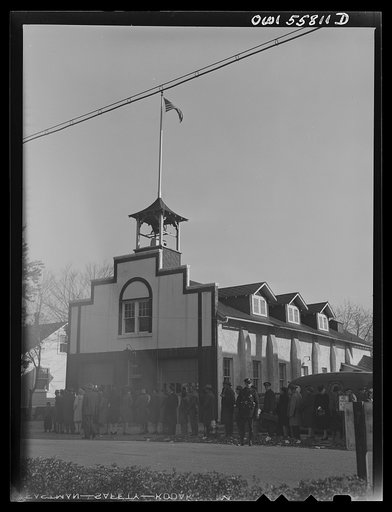 Arlington, Virginia. Citizens lined up outside the firehouse waiting to vote in the national presidental election