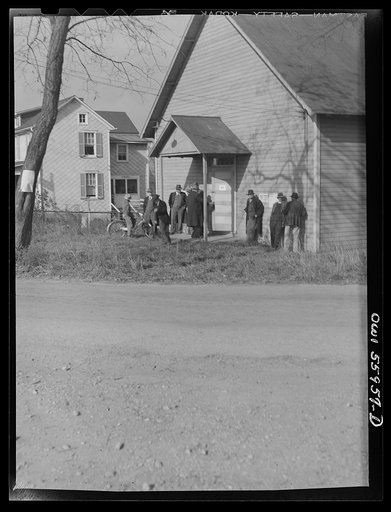 Barnesville, Maryland. A group of older citizens discussing the general election outside the community hall where they have just voted