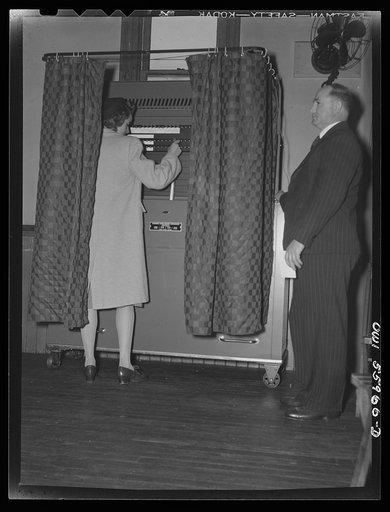 Barnesville, Maryland. A young citizen of the community casting her vote for the first time in the general election