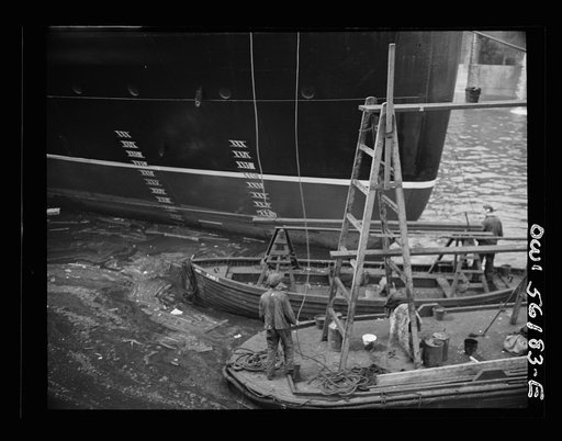 Glasgow, Scotland. Painting the stern of the S.S. Athenia