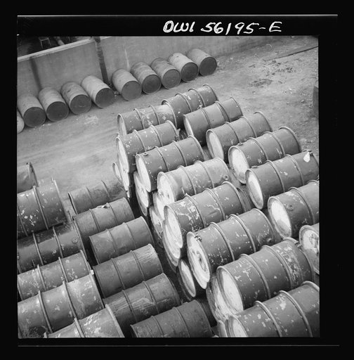 Philadelphia, Pennsylvania. Pile of oil drums near Grays Ferry Road