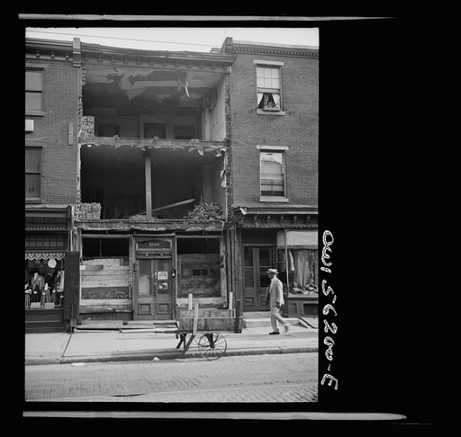 Philadelphia, Pennsylvania. A house on South Street being demolished