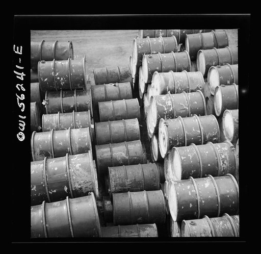 Philadelphia, Pennsylvania. File of oil drums near Grays Ferry Road