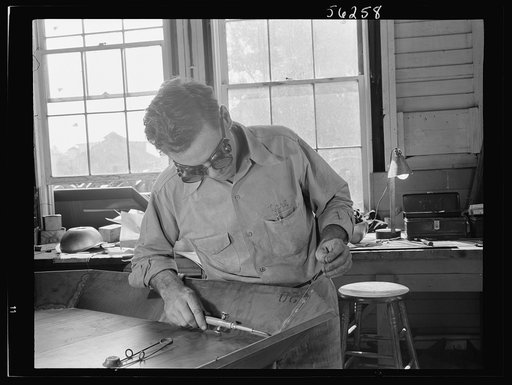 Untitled photo, possibly related to: De Land pool. Babcock airplane plant. Earl Gentry was a beverage salesman faced with the loss of his job by the impact of war. He completed 250 hours of training in the De Land, Florida vocational school. Now he's a first-class welder in the Babcock plant in De L