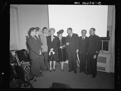 Washington, D.C. Group attending the showing of a film on S.S. Normandie at the United Nations Club. Left to right: Captain Long, Mr. Alean, Mr. Armengaud, Mrs. Valensi, Mrs. Alcan and Mr. Catrou