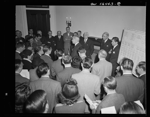 Under-Secretary of State Joseph C. Grew, after being introduced at press conference by Secretary of State Stettinius, addressing newsmen