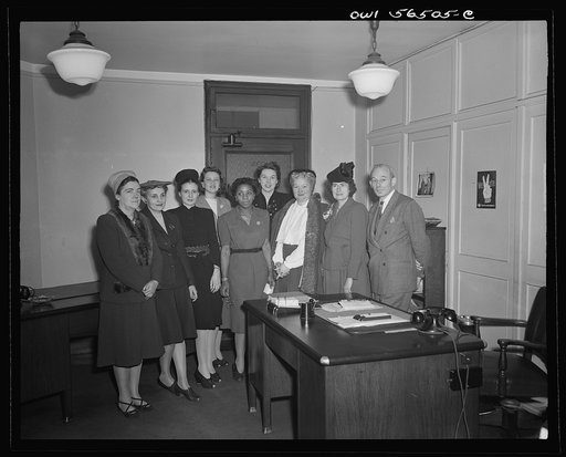 Untitled negative showing (standing left to right) Julia O'Connor Parker (International Brotherhood of Electrical Workers), Anne Murkovich (American Federation of Hosiery Workers), and (fourth from left) Maida Stewart Springer (International Ladies' Garment Workers Union)