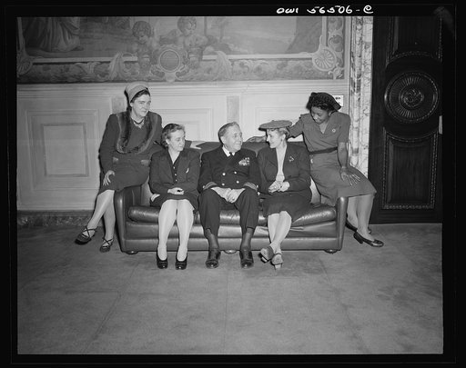 Untitled negative showing (left to right) Julia O'Connor Parker (International Brotherhood of Electrical Workers), Grace E. Blackett (United Auto Workers Union), Admiral Clark H. Woodward, Anne Murkovich (American Federation of Hosiery Workers), and Maida Stewart Springer (International Ladies' Garm