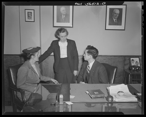 Untitled negative showing (left to right) Anne Murkovich (American Federation of Hosiery Workers) and Grace E. Blackett (United Auto Workers Union) with a man
