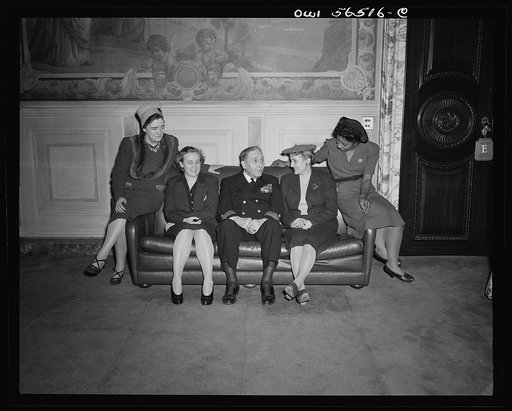 Untitled negative showing (left to right) Julia O'Connor Parker (International Brotherhood of Electrical Workers), Grace E. Blackett (United Auto Workers Union), Admiral Clark H. Woodward, Anne Murkovich (American Federation of Hosiery Workers), and Maida Stewart Springer (International Ladies' Garm