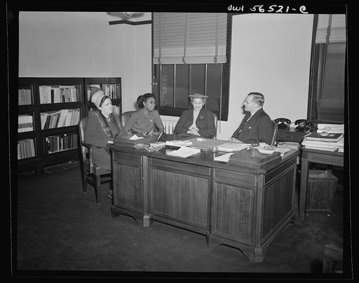 Untitled negative showing group including (left to right) Julia O'Connor Parker (International Brotherhood of Electrical Workers), Maida Stewart Springer (International Ladies' Garment Workers Union) and Anne Murkovich (American Federation of Hosiery Workers)