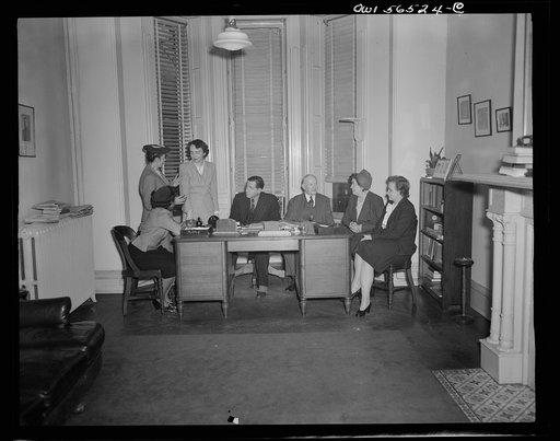 Untitled negative showing (left to right at left end of table): Maida Stewart Springer (International Ladies' Garment Workers Union) and Anne Murkovich (American Federation of Hosiery Workers) and (left to right at right end of table): Julia O'Connor Parker (International Brotherhood of Electrical W