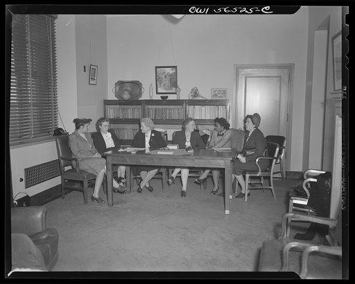 Untitled negative showing (left to right at left end of table): Anne Murkovich (American Federation of Hosiery Workers) and Grace E. Blackett (United Auto Workers Union) and (left to right at right end of table): Maida Stewart Springer (International Ladies' Garment Workers Union) and Julia O'Connor