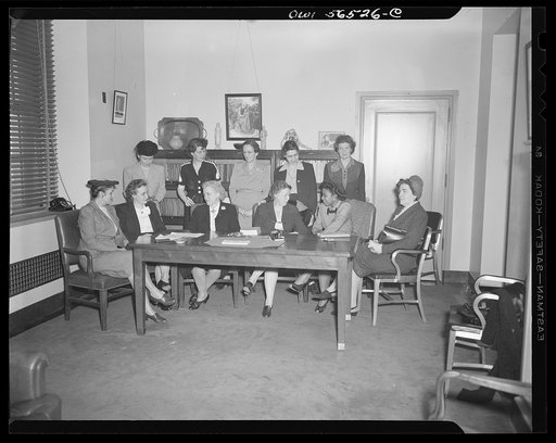 Untitled negative showing (left to right at left end of table): Anne Murkovich (American Federation of Hosiery Workers) and Grace E. Blackett (United Auto Workers Union) and (left to right at right end of table): Maida Stewart Springer (International Ladies' Garment Workers Union) and Julia O'Connor