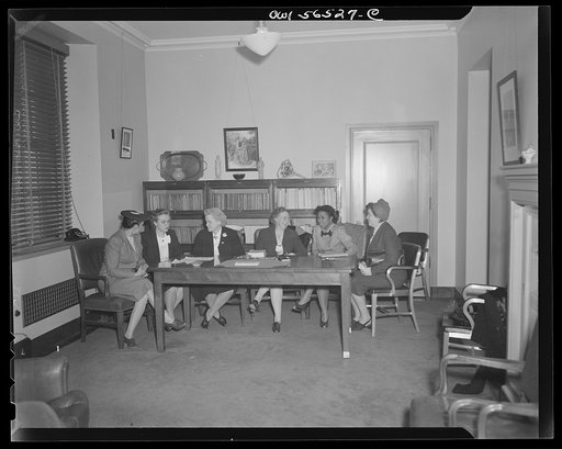 Untitled negative showing (left to right at left end of table): Anne Murkovich (American Federation of Hosiery Workers) and Grace E. Blackett (United Auto Workers Union) and (left to right at right end of table): Maida Stewart Springer (International Ladies' Garment Workers Union) and Julia O'Connor