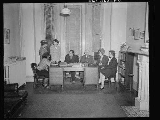 Untitled negative showing (left to right at left end of table):  Maida Stewart Springer (International Ladies' Garment Workers Union) and  Anne Murkovich (American Federation of Hosiery Workers) and (left to right at right end of table): Julia O'Connor Parker (International Brotherhood of Electrical