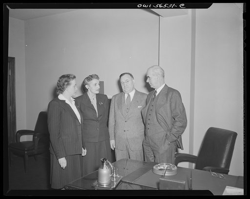 Untitled negative showing (left to right) Grace E. Blackett (United Auto Workers Union) and Anne Murkovich (American Federation of Hosiery Workers) with Philip Murray (president of the CIO) on right