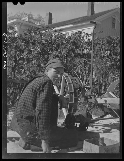 Untitled photo, possibly related to: Miscellaneous lot of photographs by Barbara Wright, e.g. University of Virginia, Franconia, New Hampshire, Maine. Finnish descent farm youth helping with repairs at Washburn Homestead, Livermore, Maine