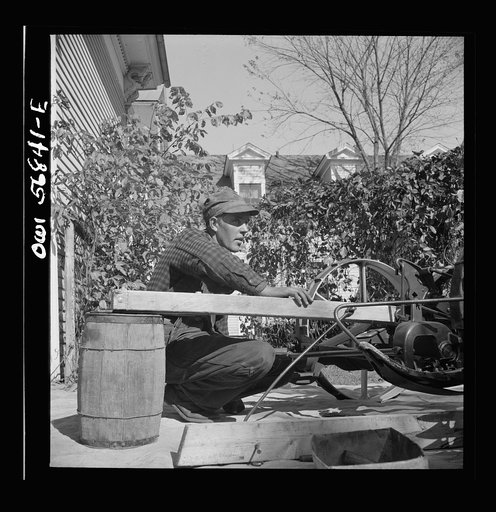 Untitled photo, possibly related to: Miscellaneous lot of photographs by Barbara Wright, e.g. University of Virginia, Franconia, New Hampshire, Maine. Finnish descent farm youth helping repairs and upkeep. New England house and farm, Livermore, Maine. Washburn homestead