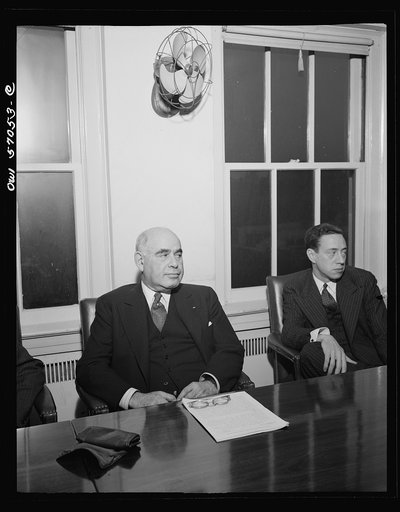 Washington, D.C. Herbert H. Lehman, Director General of the United Nations Relief and Rehabilitation Administration, holds a press conference on his return from England and the battlefronts of Europe