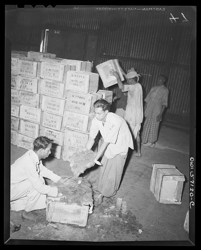United States "lend-lease" program in eastern India. Valuable mica is packed for shipment to the United States from India. Mica is essential in the manufacture of aircraft, some 16 pounds being used in each bomber. It is furnished to the United States on a reverse lend-lease basis and enjoys top pri