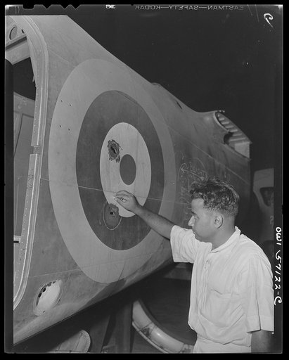 United States "lend-lease" program in eastern India. Indian workman marks bullet holes in a Hudson bomber at a lend-lease equipped repair shop "somewhere in India." Indian workman marks bullet holes made in Hudson bomber while on bombing raid in the Burma area