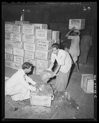 United States "lend-lease" program in eastern India. Valuable mica is packed by Indian workmen for shipment to the United States. Mica is essential in the manufacture of aircraft, some sixteen pounds being used in each bomber. It is furnished to the United States on a reverse lend-leasee basis and e