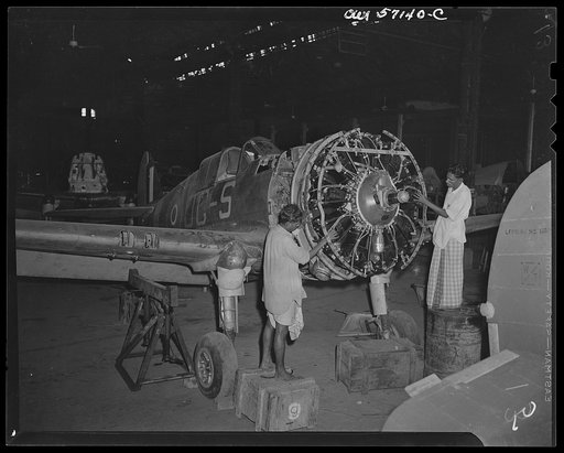 United States "lend-lease" program in eastern India. Indian workmen recondition a lend-lease Mohawk fighter plane in a workshop "somewhere in India." Repair equipment us supplied under lend-lease