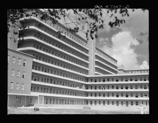 Melbourne, Australia. United States Army hospital. Exterior view of hospital. Towering high above the city is Australia's newest and finest medical structure, built as a civic enterprise as the Royal Melbourne Hospital. Today, renamed the United States Army Fourth General Hospital, it is a healing p