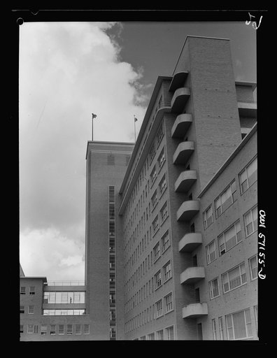 Melbourne, Australia. United States Army hospital. Exterior view of hospital. Towering high above the city is Australia's newest and finest medical structure, built as a civic enterprise as the Royal Melbourne Hospital. Today, renamed the United States Army Fourth General Hospital, it is a healing p