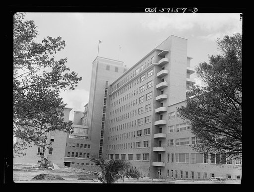 Melbourne, Australia. United States Army hospital. Exterior view of hospital. Towering high above the city is Australia's newest and finest medical structure, built as a civic enterprise as the Royal Melbourne Hospital. Today, renamed the United States Army Fourth General Hospital, it is a healing p