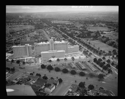 Melbourne, Australia. United States Army hospital.  Towering high above the city is Australia's newest and finest medical structure, built as a civic enterprise as the Royal Melbourne Hospital. Today, renamed the United States Army Fourth General Hospital, it is a healing place for American soldiers