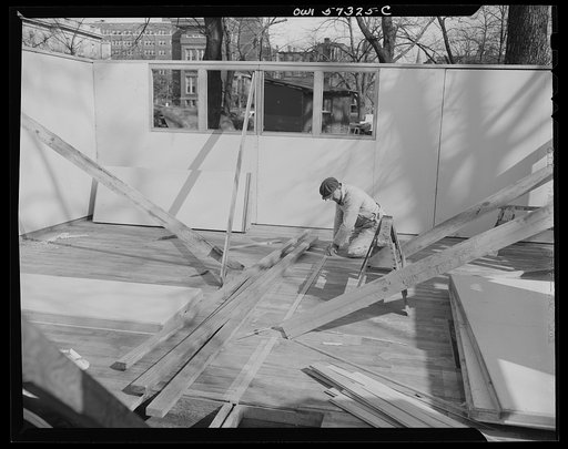 Houses for Britain. Model house of the type which it is planned to ship to Great Britain under lend-lease, at Scott Circle, Washington, D.C. Materials have been allotted to FEA by  War Production Board for 30,000 of these pre-fabricated temporary emergency dwelling units, and the Federal Public Hous