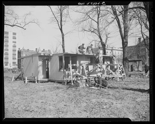 Houses for Britain.  Partially assembled pre-fabricated temporary emergency house of the type which United States will ship to Great Britain under lend-lease. War Production Board has allotted materials to the FEA for the production of 30,000 of these family dwellings. Designed for a minimum use of 