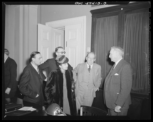 French journalists visiting the United States call on Senator George, Acting Chairman of the Foreign Relations Committee in the United States Senate. Left to right: Stephane Pizella, Mme. Etiennette Benichon, Pierre Denoyer, Senator Theodore Green, and Senator George