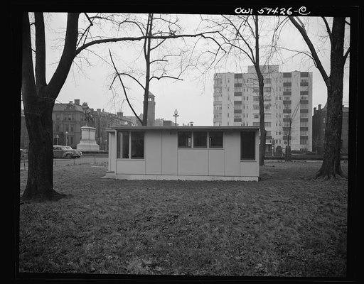 Houses for Britain. Side view of model prefabricated house erected by the Federal Public Housing Authority at Scott Circle, Washington, D.C. of the type of temporary, emergency family dwelling which it is planned to ship to Great Britain under lend-lease to alleviate acute housing shortage due to bo