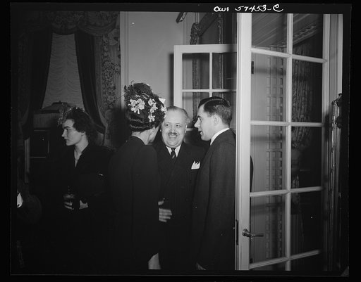 Madame Henri Bonnet, wife of French Ambassador, Ande Visson, French writer, and Andrei A. Gromyko, Ambassador from the Union of Soviet Socialist Republics at a reception celebrating International Women's Day at the home of Joseph E. Davies, former United States Ambassador to the Union of Soviet Soci