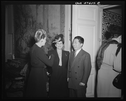 Mrs. Joseph Davies, Mrs Sidonie M. Gruenberg, Director, Child Study Association of America, Dr. Wei Tao-Ming, Chinese Ambassador at a reception celebrating International Women's Day at the home of Joseph E. Davies, former United States Ambassador to the Union of Soviet Socialist Republics