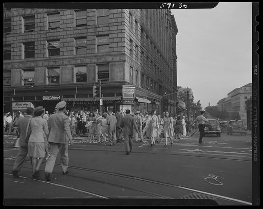Untitled photo, possibly related to: Jubilant crowd with ticker tape on V-J day, Washington, D.C