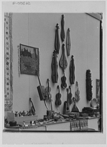 Rural arts exhibition held under the auspices of the Farm Security Administration (FSA) in the patio of the U.S. Department of Agriculture building. Musical instruments: dulcimers, fiddles, Irish bull fiddle, Paul Bunyan harp, others made from cigar box, pitchfork, gourds, cornstalks, bamboo fihing 